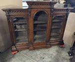 Renaissance Carved Walnut And Burl 3 Door Bookcase. Fixed Price $3895.00.