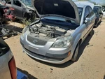 Back Glass Sedan Fits 06-11 Rio 197374. Fixed Price $75.00.